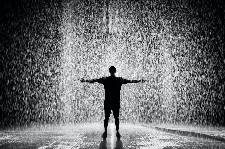 a man standing in the rain